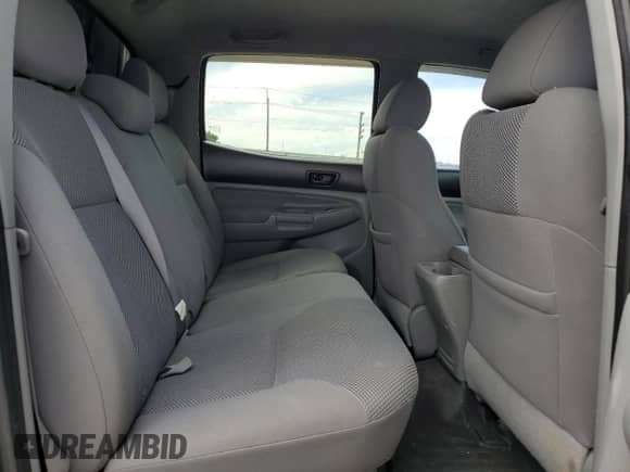 2005 Toyota Tacoma с VIN 5TELU42NX5Z019597, выставлен на аукционе Copart как лот 56408225 с пробегом Не указан миль и Списание • Salvage title. История ставок и продаж доступна на DreamBid. Изображение 10.