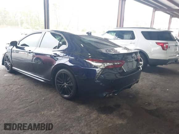 2021 Toyota Camry XSE with VIN 4T1K61AK8MU543474, listed as a IAAI auction lot 43400672 with 63,171 mi miles and . Bid and sale history available at DreamBid. Image 3.