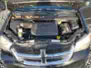 2013 Dodge Grand Caravan SE with VIN 2C4RDGBG1DR608040, listed as a Copart auction lot 85318475 with 107,927 mi miles and Salvage title. Bid and sale history available at DreamBid. Image 12.