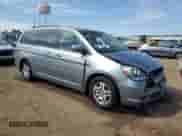 2006 Honda Odyssey EX with VIN 5FNRL38416B108161, listed as a Copart auction lot 71797655 with Not provided miles and Salvage title. Bid and sale history available at DreamBid. Image 4.