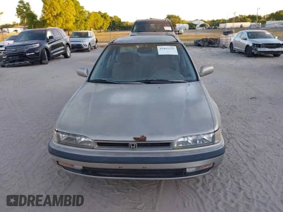 1991 Honda Accord LX z VIN JHMCB7651MC015726, wystawiony jako IAAI lot #41843620 z przebiegiem 55 563 mil mil oraz . Historia ofert i sprzedaży dostępna na DreamBid. Obrazek 6.