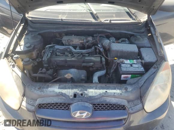 2008 Hyundai Accent SE z VIN KMHCN36C38U087622, wystawiony jako Copart lot #84217995 z przebiegiem 222 658 mil mil oraz Czysty tytuł • Clean title. Historia ofert i sprzedaży dostępna na DreamBid. Obrazek 11.