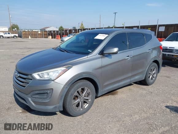 2015 Hyundai Santa Fe with VIN 5XYZTDLB7FG232830, listed as a IAAI auction lot 43133802 with 161,217 mi miles and . Bid and sale history available at DreamBid. Image 2.