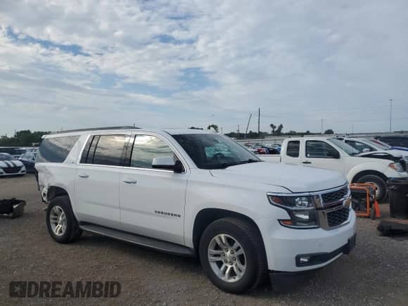 2018 Chevrolet Suburban LT with VIN 1GNSKHKC9JR281115, listed as a Copart auction lot 68086295 with 183,315 mi miles and Salvage title. Bid and sale history available at DreamBid. Image 4.