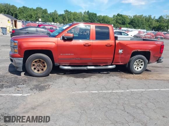 2015 Chevrolet Silverado 1500 LT z VIN 1GCVKREH1FZ194142, wystawiony jako IAAI lot #43016369 z przebiegiem 213 511 mil mil oraz . Historia ofert i sprzedaży dostępna na DreamBid. Obrazek 14.