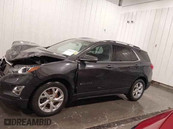 2019 Chevrolet Equinox LT z VIN 2GNAXLEX4K6213364, wystawiony jako IAAI lot #42586725 z przebiegiem 95 681 mil mil oraz . Historia ofert i sprzedaży dostępna na DreamBid. Obrazek 14.
