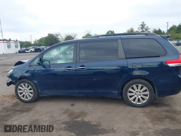 2011 Toyota Sienna XLE with VIN 5TDDK3DC1BS019352, listed as a IAAI auction lot 43308237 with 200,321 mi miles and . Bid and sale history available at DreamBid. Image 14.