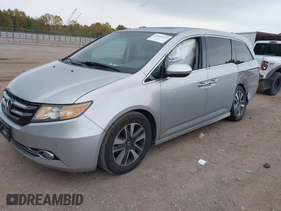 2015 Honda Odyssey Touring Elite z VIN 5FNRL5H99FB088572, wystawiony jako IAAI lot #43376437 z przebiegiem 187 701 mil mil oraz . Historia ofert i sprzedaży dostępna na DreamBid. Obrazek 2.