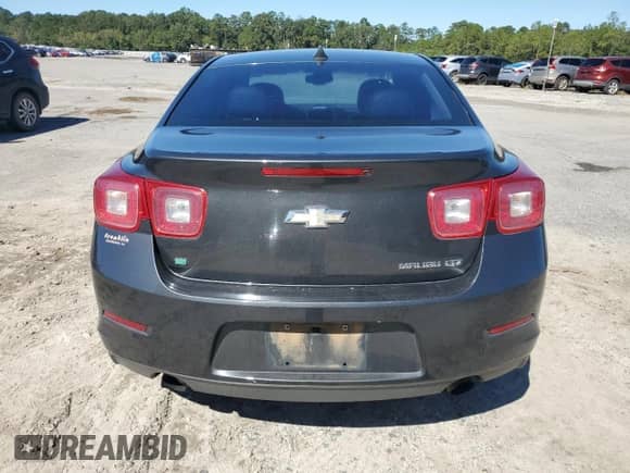 2014 Chevrolet Malibu LTZ with VIN 1G11H5SL0EF209060, listed as a Copart auction lot 86602555 with 323,622 mi miles and Salvage title. Bid and sale history available at DreamBid. Image 6.