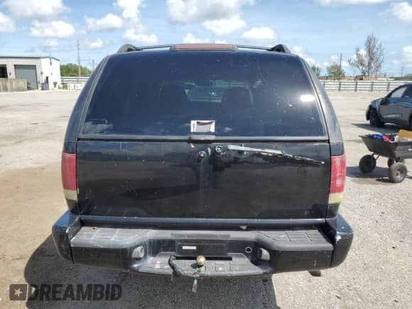 2000 Chevrolet Blazer LS with VIN 1GNCS13W62K142736, listed as a Copart auction lot 73249844 with 141,788 mi miles and Salvage title. Bid and sale history available at DreamBid. Image 6.