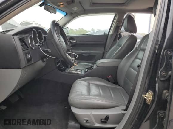 2005 Dodge Magnum SE with VIN 2D4FV48V65H510653, listed as a Copart auction lot 70927144 with 105,350 mi miles and Salvage title. Bid and sale history available at DreamBid. Image 7.