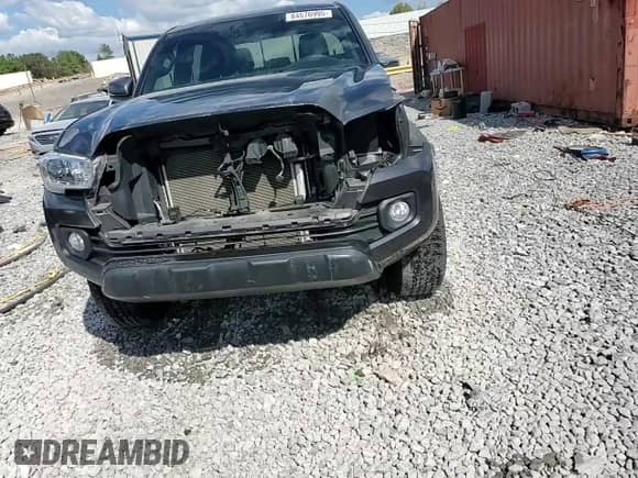 2022 Toyota Tacoma TRD Off Road with VIN 3TMCZ5AN4NM515100, listed as a Copart auction lot 84576995 with 33,917 mi miles and Salvage title. Bid and sale history available at DreamBid. Image 14.
