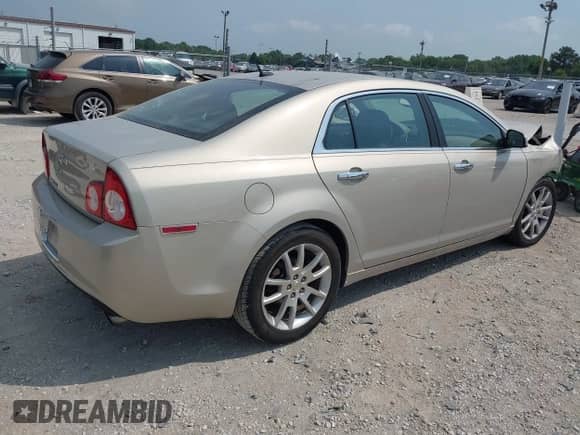 2011 Chevrolet Malibu LTZ with VIN 1G1ZE5E7XBF202929, listed as a IAAI auction lot 42942715 with 119,332 mi miles and . Bid and sale history available at DreamBid. Image 4.