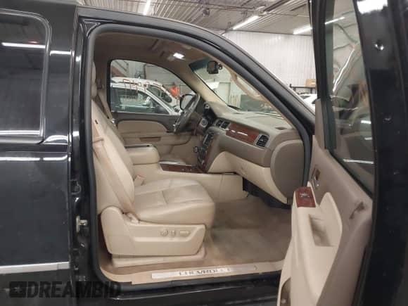2010 Chevrolet Tahoe LTZ with VIN 1GNUKCE01AR179983, listed as a IAAI auction lot 42459947 with 181,127 mi miles and . Bid and sale history available at DreamBid. Image 5.
