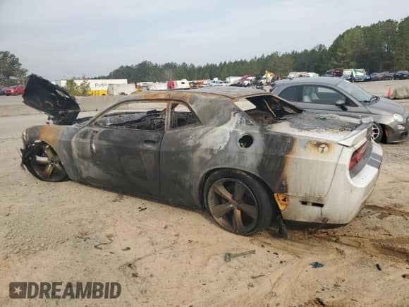 2012 Dodge Challenger SRT-8 392 с VIN 2C3CDYCJXCH123569, выставлен на аукционе Copart как лот 48527025 с пробегом Не указан миль и Списание • Salvage title. История ставок и продаж доступна на DreamBid. Изображение 2.