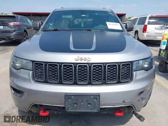 2019 Jeep Grand Cherokee Trailhawk z VIN 1C4RJFLG3KC771909, wystawiony jako IAAI lot #42045267 z przebiegiem 108 084 mil mil oraz . Historia ofert i sprzedaży dostępna na DreamBid. Obrazek 12.