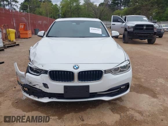 2018 BMW 3 Series 330i with VIN WBA8B9C59JEE82660, listed as a IAAI auction lot 41899267 with 65,205 mi miles and . Bid and sale history available at DreamBid. Image 13.