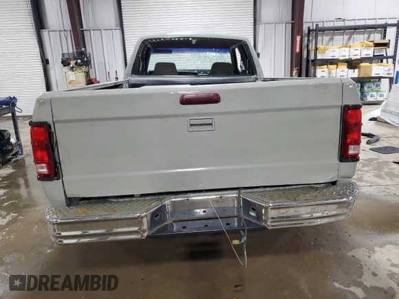 1996 Dodge Dakota z VIN 1B7GG23XXTS645438, wystawiony jako Copart lot #57796965 z przebiegiem 129 416 mil mil oraz Szkoda całkowita • Salvage title. Historia ofert i sprzedaży dostępna na DreamBid. Obrazek 6.