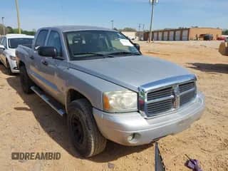 2007 Dodge Dakota SLT with VIN 1D7HW48N37S118556, listed as a IAAI auction lot 41858854 with 155,038 mi miles and . Bid and sale history available at DreamBid. Image 1.