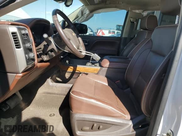 2017 Chevrolet Silverado 1500 High Country с VIN 3GCUKTEJXHG216945, выставлен на аукционе Copart как лот 85794395 с пробегом 129 032 миль миль и Списание • Salvage title. История ставок и продаж доступна на DreamBid. Изображение 7.