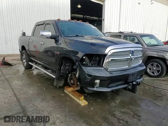 2015 Ram 1500 Laramie Longhorn z VIN 1C6RR7PM8FS633140, wystawiony jako Copart lot #82487774 z przebiegiem 100 155 mil mil oraz Szkoda całkowita • Salvage title. Historia ofert i sprzedaży dostępna na DreamBid. Obrazek 13.