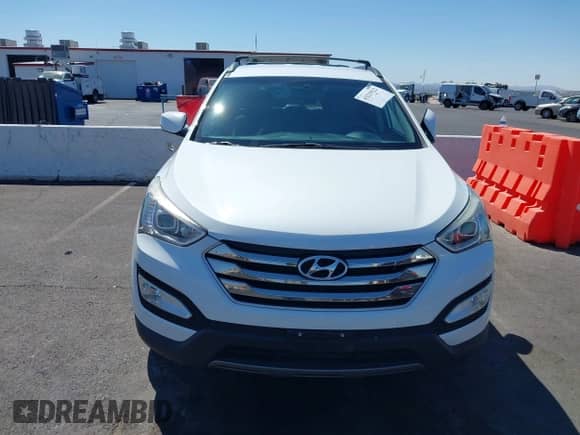 2016 Hyundai Santa Fe with VIN 5XYZU3LBXGG316388, listed as a IAAI auction lot 43215922 with 123,510 mi miles and . Bid and sale history available at DreamBid. Image 6.