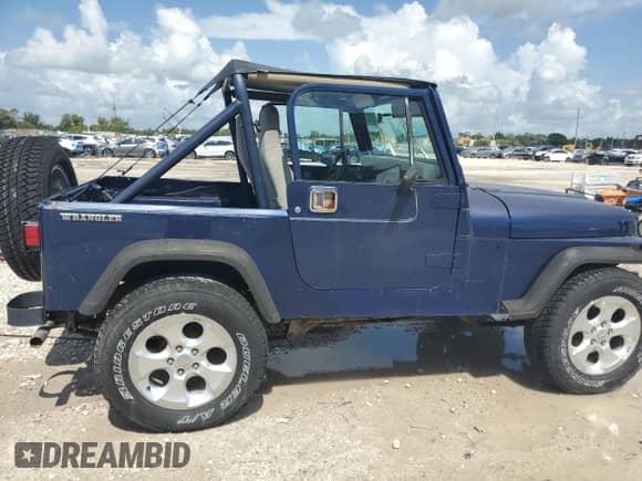 1990 Jeep Wrangler с VIN 2J4FY29TXLJ531804, выставлен на аукционе Copart как лот 65004215 с пробегом 108 658 миль миль и Чистый • Clean title. История ставок и продаж доступна на DreamBid. Изображение 10.