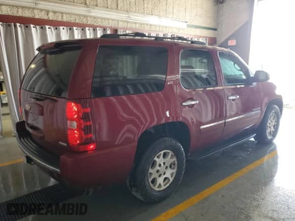 2009 Chevrolet Tahoe LTZ z VIN 1GNFK33049J120917, wystawiony jako Copart lot #69056055 z przebiegiem 196 295 mil mil oraz Czysty tytuł • Clean title. Historia ofert i sprzedaży dostępna na DreamBid. Obrazek 3.