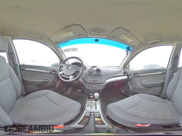 2009 Chevrolet Aveo LS z VIN KL1TD56E59B299155, wystawiony jako Copart lot #86313504 z przebiegiem 167 024 mil mil oraz Szkoda całkowita • Salvage title. Historia ofert i sprzedaży dostępna na DreamBid. Obrazek 13.