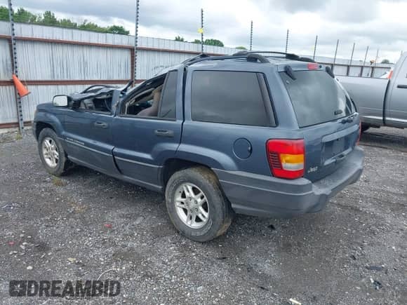 2004 Jeep Grand Cherokee Laredo with VIN 1J4GX48S34C213420, listed as a IAAI auction lot 42221769 with 194,163 mi miles and . Bid and sale history available at DreamBid. Image 3.