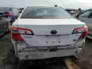 2012 Toyota Camry XLE z VIN 4T1BD1FK5CU054012, wystawiony jako Copart lot #85195425 z przebiegiem 451 292 mil mil oraz Szkoda całkowita • Salvage title. Historia ofert i sprzedaży dostępna na DreamBid. Obrazek 6.