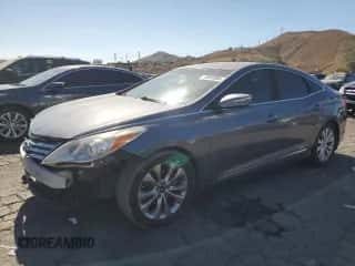 2013 Hyundai Azera с VIN KMHFG4JG1DA200387, выставлен на аукционе Copart как лот 78887004 с пробегом 130 876 миль миль и Списание • Salvage title. История ставок и продаж доступна на DreamBid. Изображение 1.