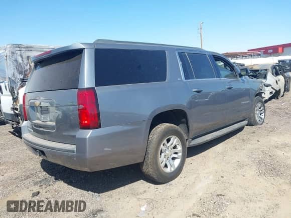 2020 Chevrolet Suburban LT with VIN 1GNSKHKC1LR156323, listed as a IAAI auction lot 42541369 with Not provided miles and . Bid and sale history available at DreamBid. Image 4.