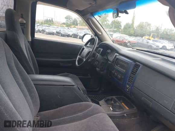 2003 Dodge Dakota with VIN 1D7FL16X83S140498, listed as a IAAI auction lot 43294302 with 106,313 mi miles and . Bid and sale history available at DreamBid. Image 5.