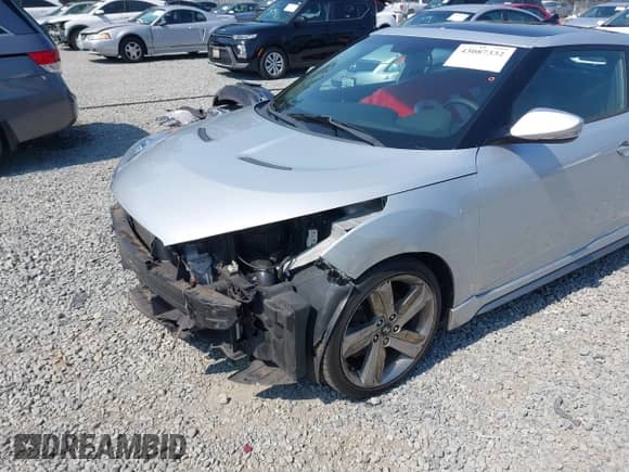 2013 Hyundai Veloster Turbo с VIN KMHTC6AE6DU083543, выставлен на аукционе IAAI как лот 43087332 с пробегом 158 716 миль миль и . История ставок и продаж доступна на DreamBid. Изображение 6.