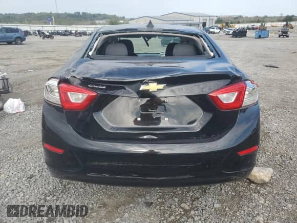 2018 Chevrolet Cruze LS с VIN 1G1BC5SM0J7200794, выставлен на аукционе Copart как лот 85366385 с пробегом Не указан миль и Списание • Salvage title. История ставок и продаж доступна на DreamBid. Изображение 6.