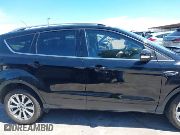 2017 Ford Escape Titanium with VIN 1FMCU0J97HUE26024, listed as a IAAI auction lot 42828848 with 67,634 mi miles and . Bid and sale history available at DreamBid. Image 13.