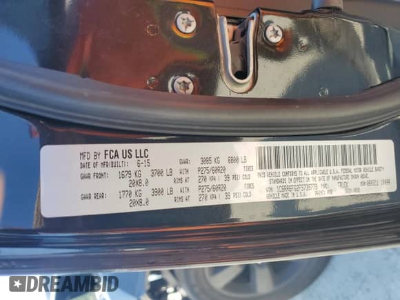 2015 Ram 1500 Tradesman with VIN 1C6RR6FG2FS735779, listed as a Copart auction lot 84011205 with Not provided miles and Salvage title. Bid and sale history available at DreamBid. Image 12.