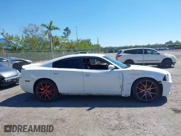 2014 Dodge Charger SE with VIN 2C3CDXBG9EH315018, listed as a IAAI auction lot 41754604 with 103,676 mi miles and . Bid and sale history available at DreamBid. Image 13.