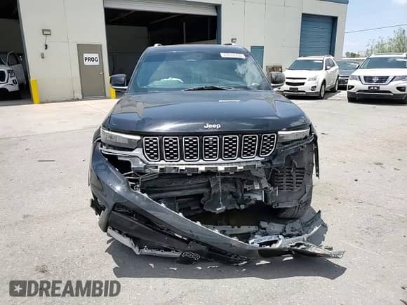 2021 Jeep Grand Cherokee Summit Reserve with VIN 1C4RJKEG2M8116216, listed as a Copart auction lot 63512755 with 70,080 mi miles and Salvage title. Bid and sale history available at DreamBid. Image 14.