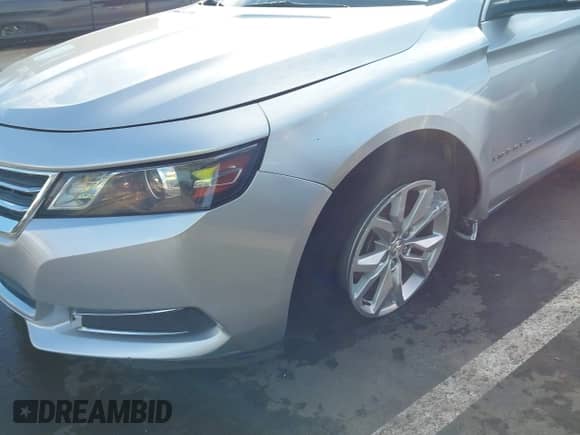 2017 Chevrolet Impala LT z VIN 1G1105S37HU210536, wystawiony jako IAAI lot #43265606 z przebiegiem 147 505 mil mil oraz . Historia ofert i sprzedaży dostępna na DreamBid. Obrazek 6.