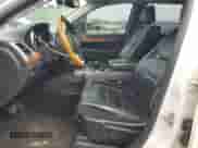 2012 Jeep Grand Cherokee Overland z VIN 1C4RJFCG8CC189340, wystawiony jako Copart lot #81435495 z przebiegiem 112 541 mil mil oraz Szkoda całkowita • Salvage title. Historia ofert i sprzedaży dostępna na DreamBid. Obrazek 7.