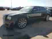 2006 Chrysler 300 C SRT-8 с VIN 2C3LA73W56H102728, выставлен на аукционе Copart как лот 63040605 с пробегом 145 411 миль миль и Чистый • Clean title. История ставок и продаж доступна на DreamBid. Изображение 1.