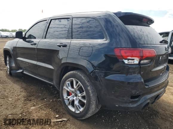 2018 Jeep Grand Cherokee SRT z VIN 1C4RJFDJ2JC431238, wystawiony jako Copart lot #58176495 z przebiegiem 77 458 mil mil oraz Szkoda całkowita • Salvage title. Historia ofert i sprzedaży dostępna na DreamBid. Obrazek 2.