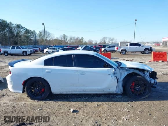 2023 Dodge Charger Scat Pack with VIN 2C3CDXGJ4PH626959, listed as a IAAI auction lot 41448760 with 13,201 mi miles and . Bid and sale history available at DreamBid. Image 14.