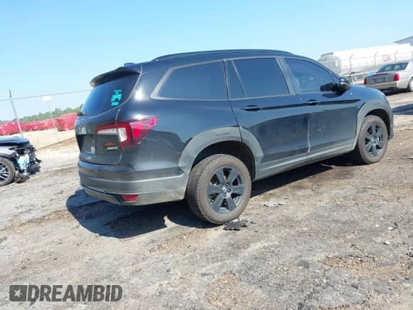 2022 Honda Pilot TrailSport with VIN 5FNYF6H84NB085965, listed as a IAAI auction lot 42556978 with 85,611 mi miles and . Bid and sale history available at DreamBid. Image 4.