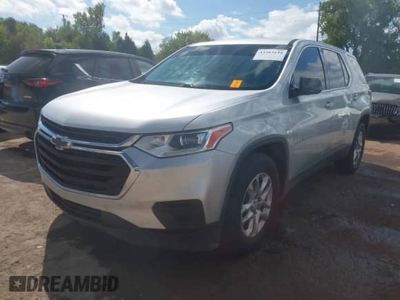 2019 Chevrolet Traverse LS z VIN 1GNERFKW7KJ186981, wystawiony jako IAAI lot #43303144 z przebiegiem 130 898 mil mil oraz . Historia ofert i sprzedaży dostępna na DreamBid. Obrazek 19.