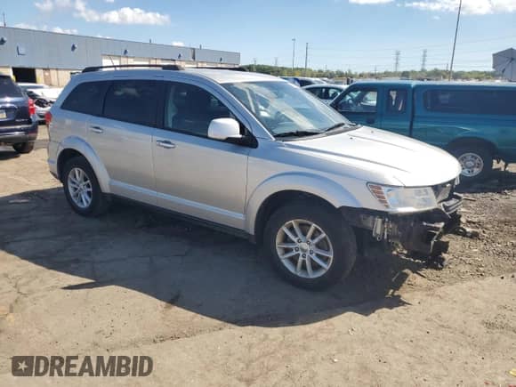 2013 Dodge Journey SXT z VIN 3C4PDCBG1DT560844, wystawiony jako Copart lot #84458555 z przebiegiem 161 542 mil mil oraz Szkoda całkowita • Salvage title. Historia ofert i sprzedaży dostępna na DreamBid. Obrazek 4.