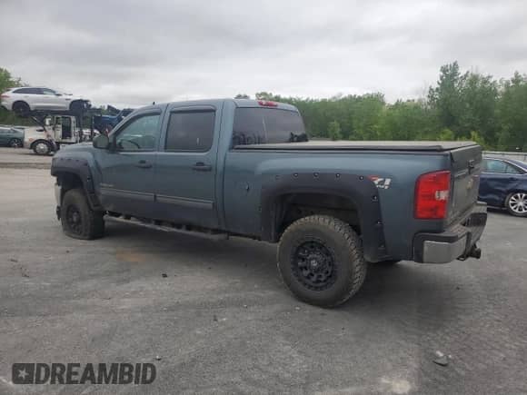 2012 Chevrolet Silverado 2500HD LT with VIN 1GC1KXCG5CF103416, listed as a Copart auction lot 58614575 with 86,968 mi miles and Salvage title. Bid and sale history available at DreamBid. Image 2.