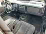 2001 Dodge Dakota z VIN 1B7GL22X91S341785, wystawiony jako Copart lot #90262095 z przebiegiem 164 468 mil mil oraz Szkoda całkowita • Salvage title. Historia ofert i sprzedaży dostępna na DreamBid. Obrazek 8.